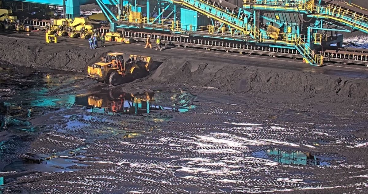 Stacker boom over the stockpile during belt replacement